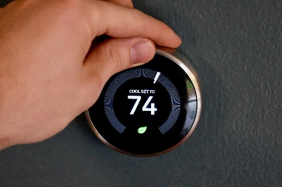 A smart thermostat set to 74 degrees