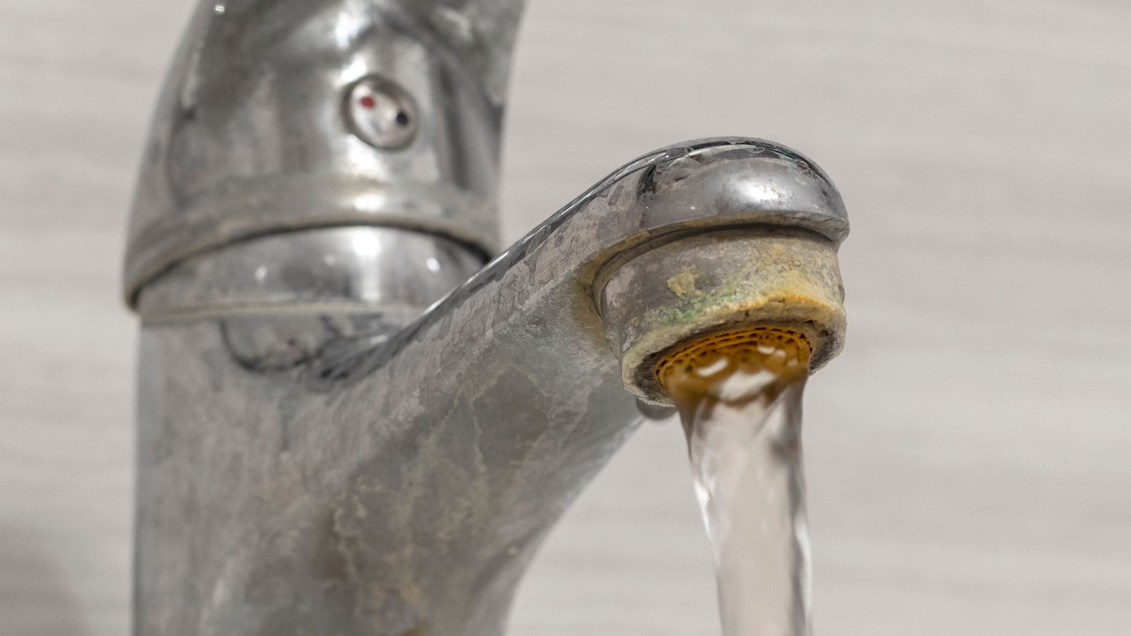 Hard water buildup on a faucet